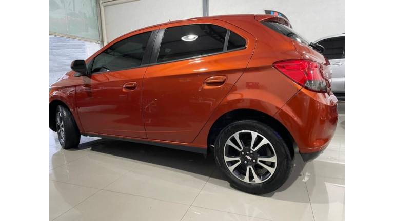 CHEVROLET - ONIX - 2013/2013 - Laranja - R$ 47.800,00